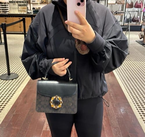 شنطه كوتش بني غامق كرستال