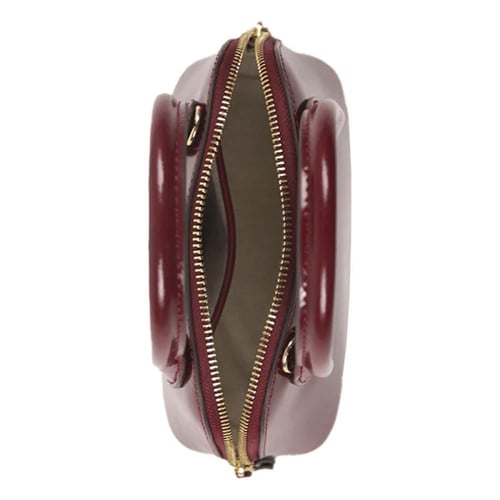 شنطة توري بورش إيمرسون ميني عنابي