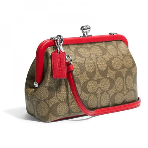 شنطة كوتش نورا لون بني