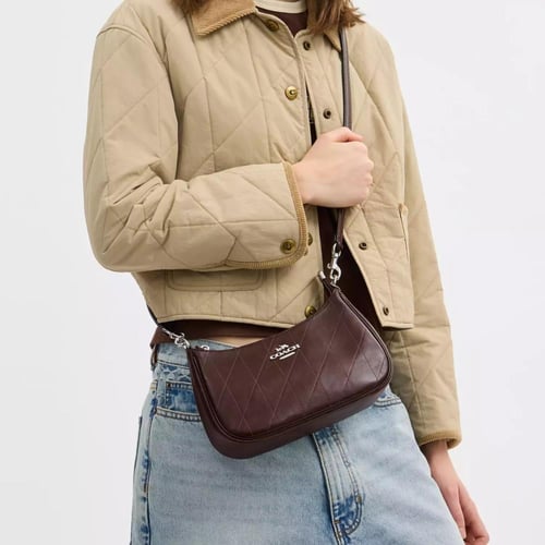 شنطة كوتش تيري عنابي