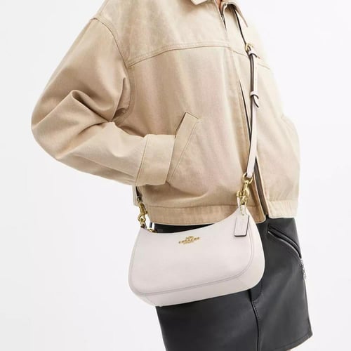 شنطة كوتش تيري كريمي