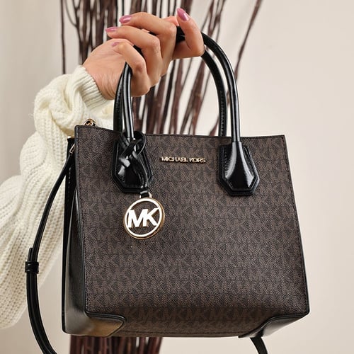 شنطة مايكل كورس من الأكورديون بني