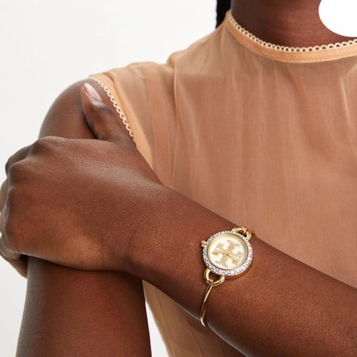 ساعة توري بورش ميللر بانجل ذهبي