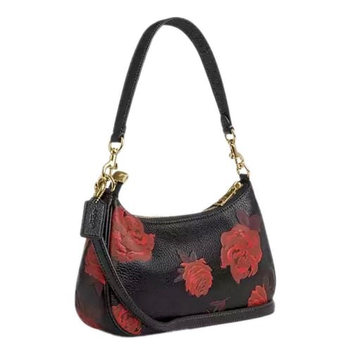 شنطه كوتش مطبوعه بالورد