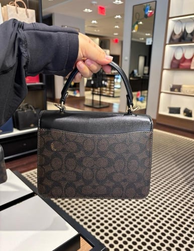 شنطه كوتش بني غامق كرستال