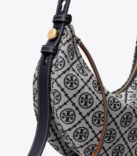 شنطة توري بورش مونوغرام رومي أزرق