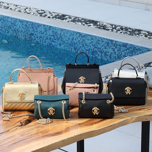 شنطة روبرتو كفالي ذهبية بالشعار