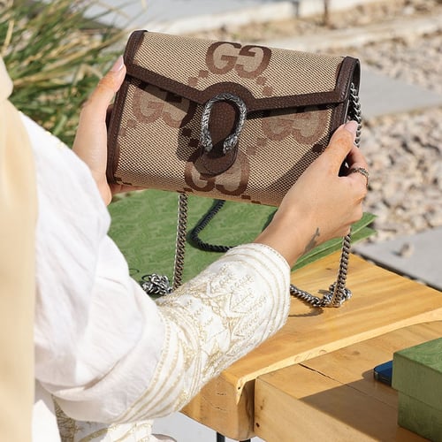 شنطة قوتشي صغيرة بني