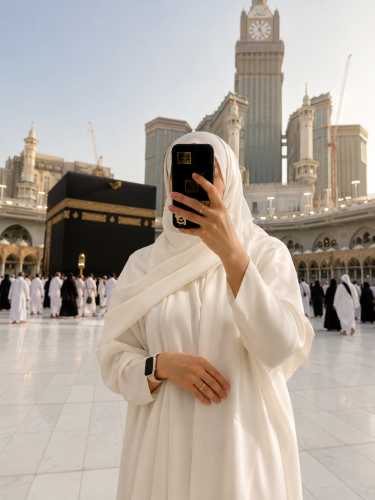 A pilgrimage and Umrah abaya with a wide cut and a white headscarf