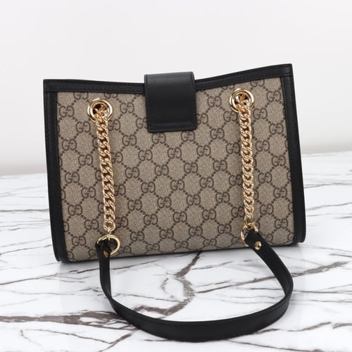 شنط قوتشي - حقيبة تقوتشي بادلوك