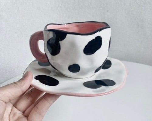 كوب سيراميك بطبعة مميزة .