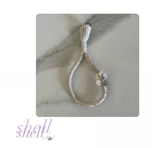 تعليقة جوال بالخيوط