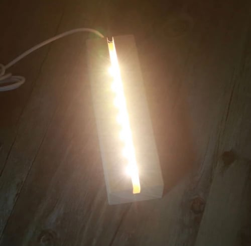 قاعده خشبيه متوفره شكل مستطيل طول 15عرض 5 فتحت الا...