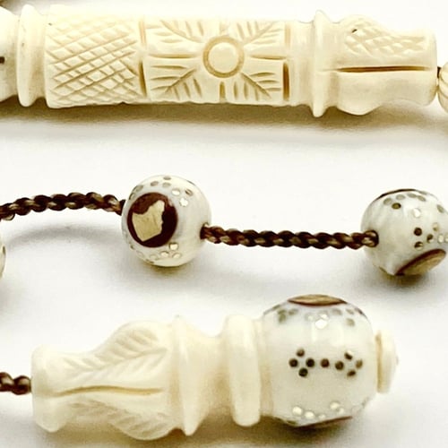 سبحة عاج الفيل الطبيعي (مطعم)