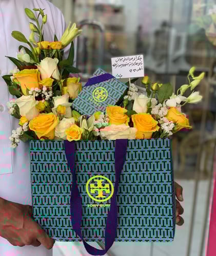 تنسيق مجموعه هدايا على كيس توري بورش