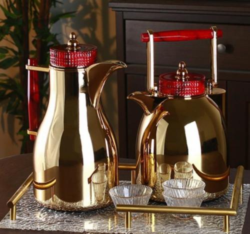 طقم ترامس ذهبي بيد احمر