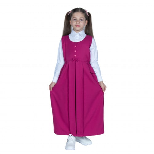 مريول مدرسي أبتدائي بلون فوشي بأزرار وفيونكا من كن...