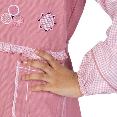 مريول إبتدائي زهري بتصميم كويتي من ذو الجناحين