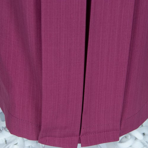 مريول مدرسي أبتدائي بلون وردي مخطط من كنزي