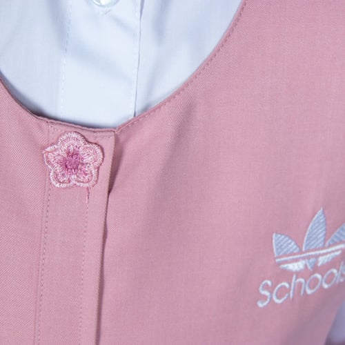 مريول زهري إبتدائي بتصميم أنيق من ذو الجناحين