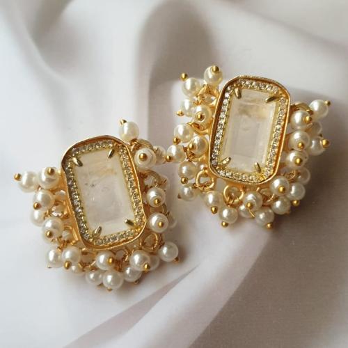 Gold-plated ear ring decorated with natural stones...
