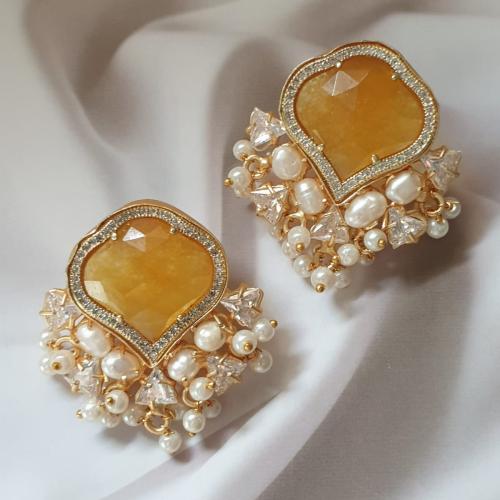 Gold-plated ear ring decorated with natural stones...