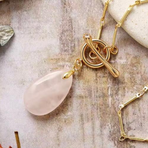 A coated chain decorated with rose quartz stone