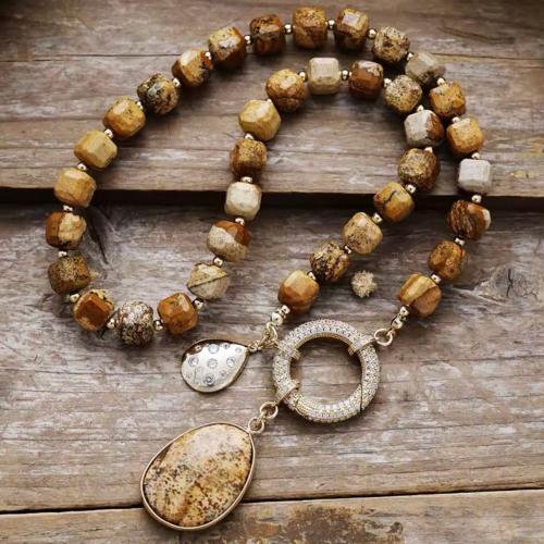 A necklace made of natural stones is a necklace co...