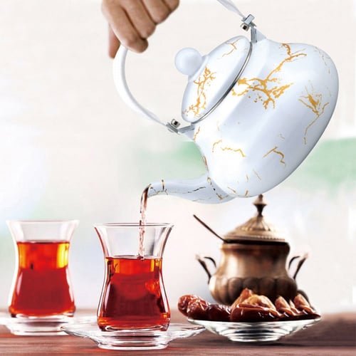 ابريق شاي غضار أبيض مزخرف