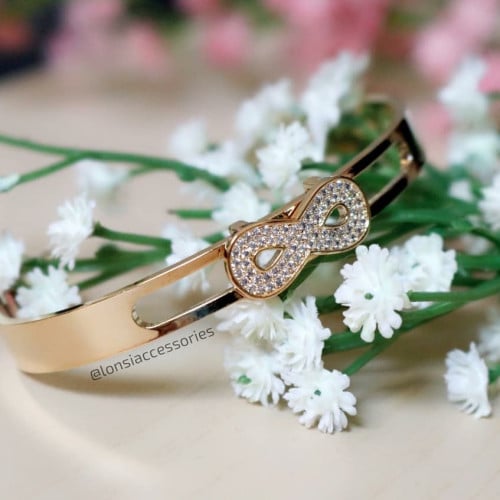 اسوارة زركون ذهبي بنقل