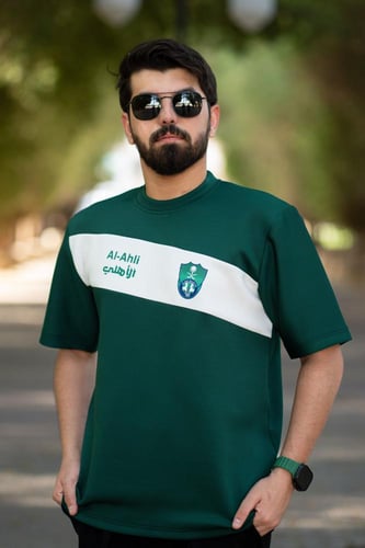 تيشرت الأهلي أخضر بشريط أبيض مائل
