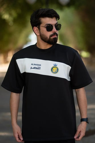تيشرت النصر أسود بشريط أبيض مائل