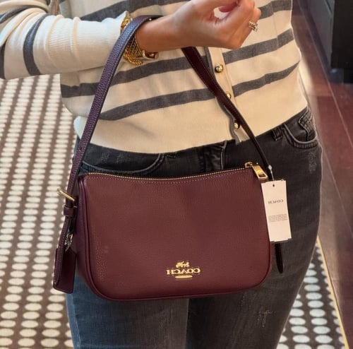 شنطة كوتش عنابي