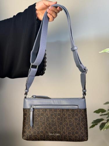 شنطة كالفن كلاين بني مع أزرق