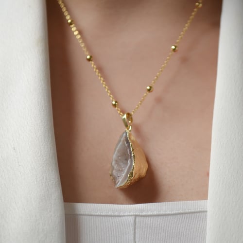 قطعة من الحجر الطبيعي ((لون اسود)) المطلي بالذهب ا...