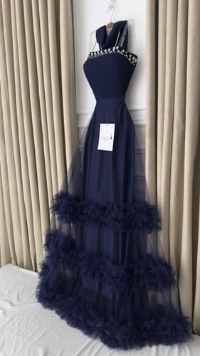 فستان سهرة كحلي بتنورة تول طبقات