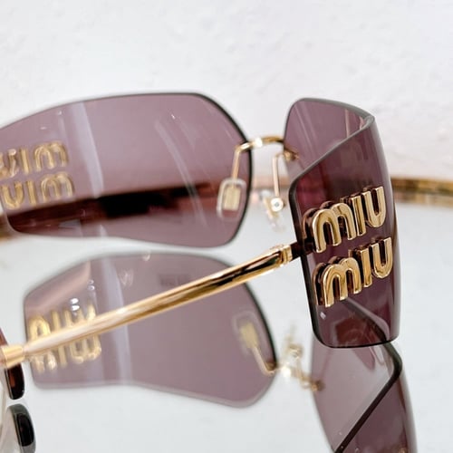Sunglasses miumiu