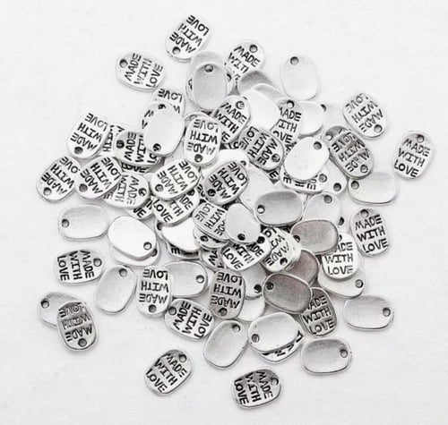 لوجو معدني بـ3 اشكال عشوائية 12 حبة