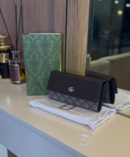 شنطة قوتشي بني داكن صغيرة ماستر