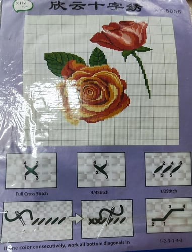 قماش ايتامين مرسوم عليه مع ابرة وخيوط