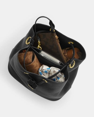 كوتش Rowan Bucket Bag In Signature Canvas بالطلب ٣...