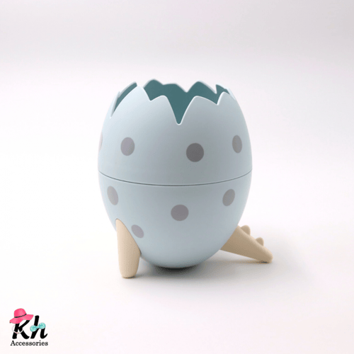 حامل أقلام بيضة الديناصور