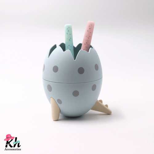 حامل أقلام بيضة الديناصور