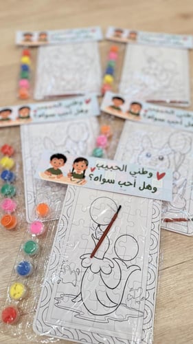 توزيعات تركيب+ الوان مائيه اليوم الوطني للاطفال