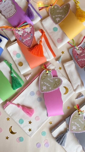 توزيعات العيد-شنط الميك اب ملونه