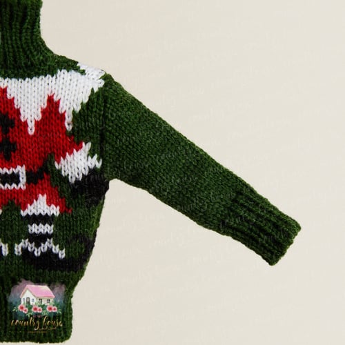 6213 اكسسوار وتعليقة شتوية بشكل بلوزة