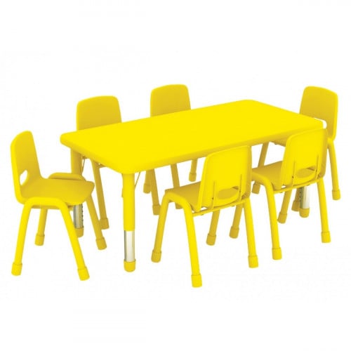 A set of chairs and tables 6 chairs and a table
