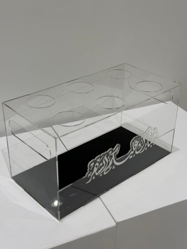 حامل فناجيل بالاضافه الى عباره