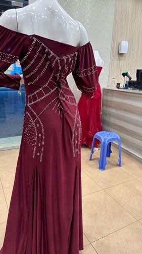 فستان عودي يده تل