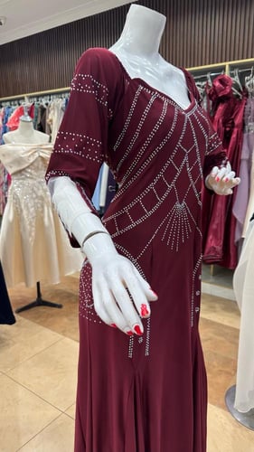 فستان عودي يده تل